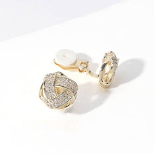 Load image into Gallery viewer, Sensi - 14K Gold Plated CZ Stone Paved Knot Stud Clip On Earrings

